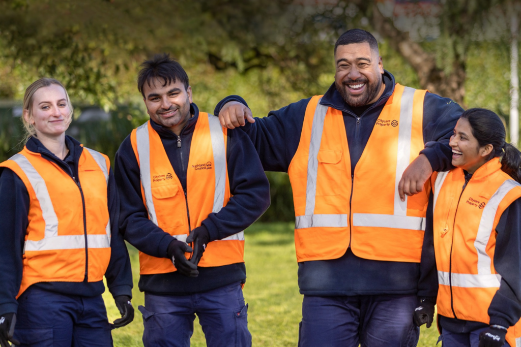 citycare property employees in high-vis vests smiling